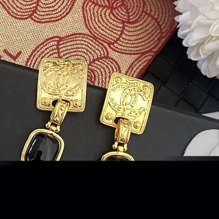 Ch*el earrings